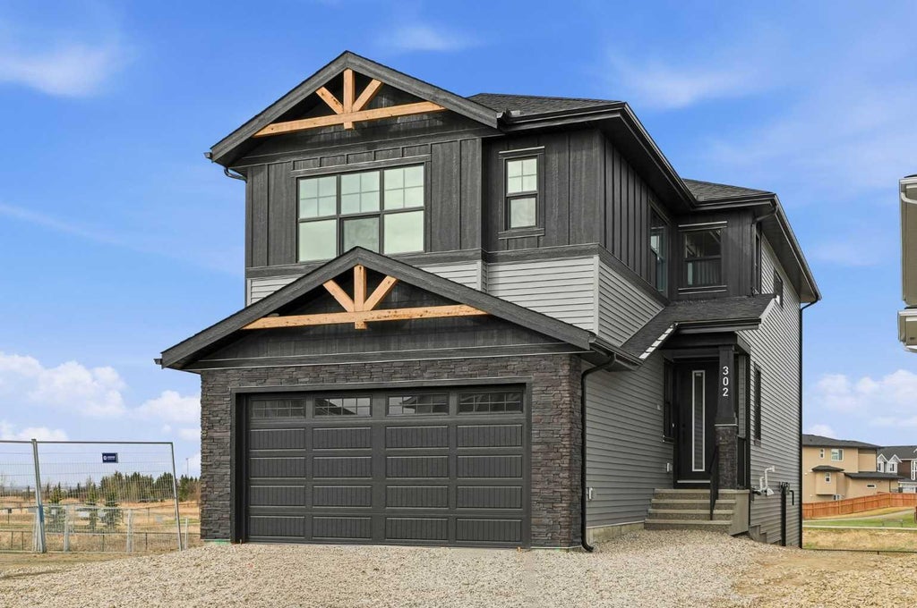Photo of 302 Kinniburgh Loop, Chestermere, AB T1X 3C3 (MLS # A2320577)