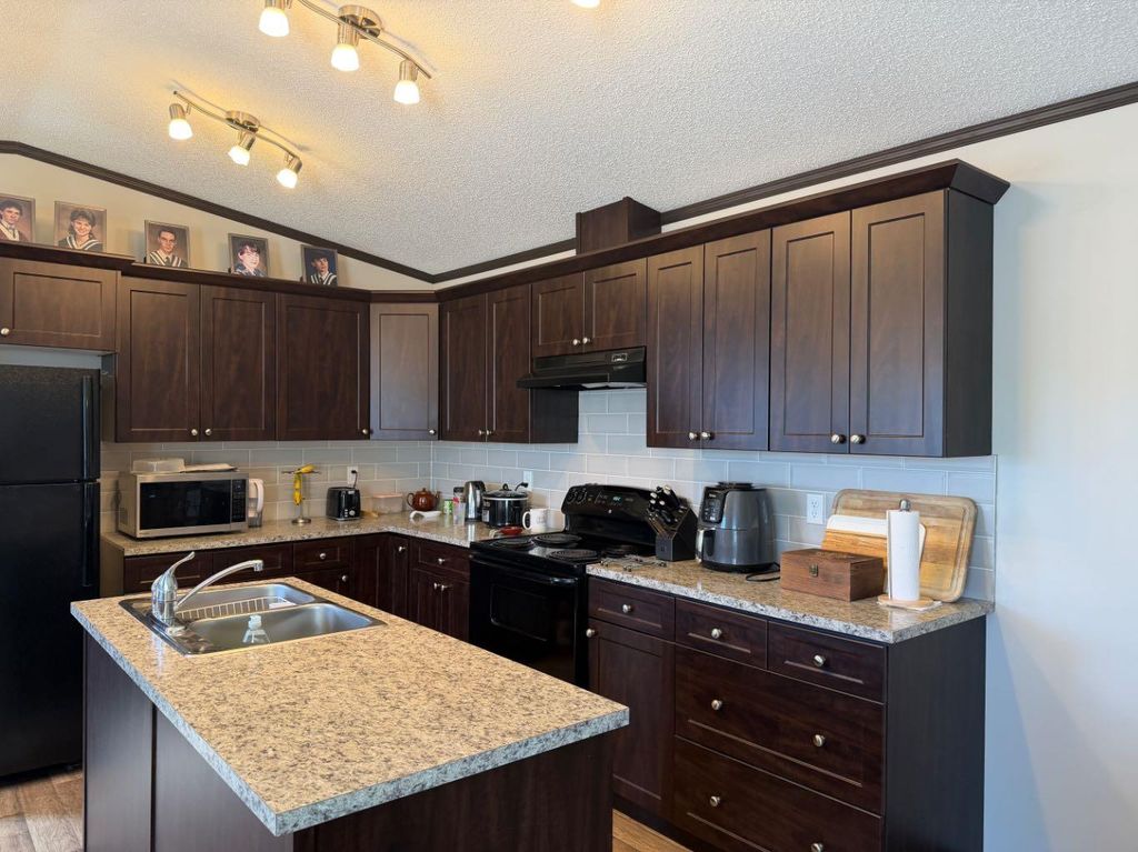 Photo of 84 Greenwood Villa, Drumheller, AB T0J 0Y2 (MLS # A2310503)