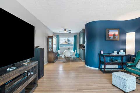 Photo of 126 Springwood Drive SW, Calgary, AB T2W 0K5 (MLS # A2316658)