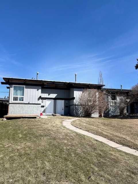 Photo of 92 Queen Isabella Close SE, Calgary, AB T2J 3R1 (MLS # A2297621)