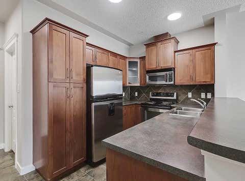 Tiny photo for 20 Discovery Ridge Close SW #241, Calgary, AB T3H 5X4 (MLS # A2326315)