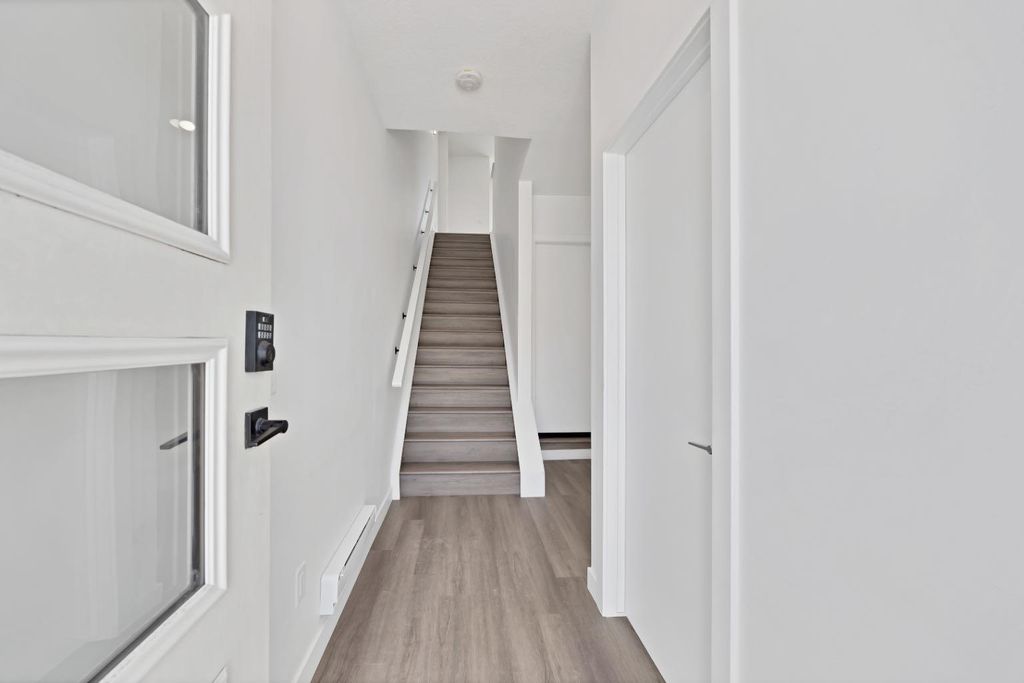 Photo of 105 Panatella Square NW, Calgary, AB T3K 2R9 (MLS # A2304366)