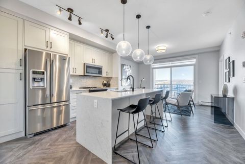 Photo of 35 Walgrove Walk SE #409, Calgary, AB T2X 4S6 (MLS # A2263861) Photo of 35 Walgrove Walk SE #409, Calgary, AB T2X 4S6 (MLS # A2263861)