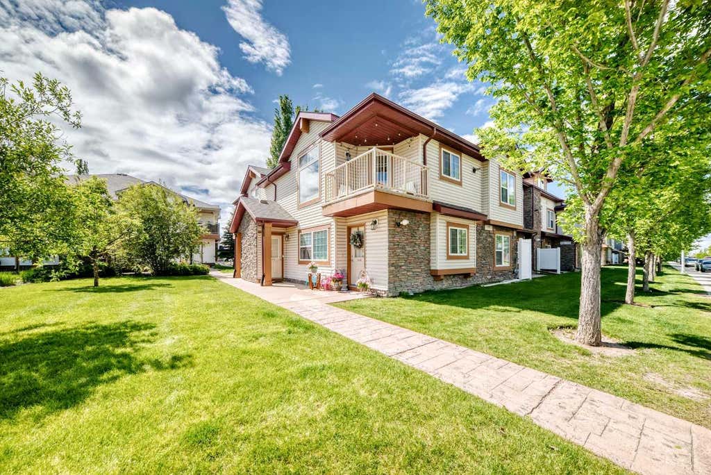 Photo of 140 Panatella Landing NW #106, Calgary, AB T3K 0K8 (MLS # A2320853)