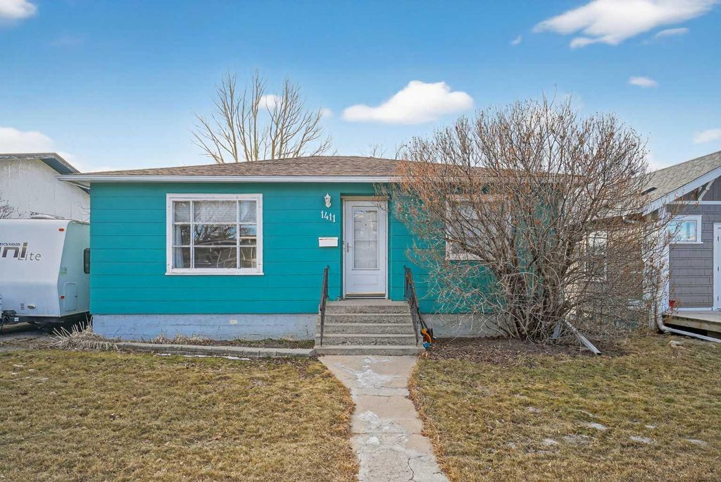 Photo of 1411 20 Avenue NW, Calgary, AB T2M 1G6 (MLS # A2298584)