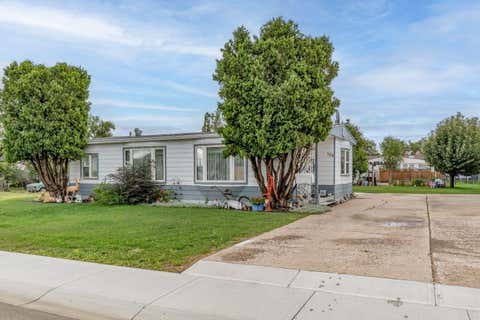 Photo of 106 2 Street NE, Redcliff, AB T0J 2P2 (MLS # A2338461)