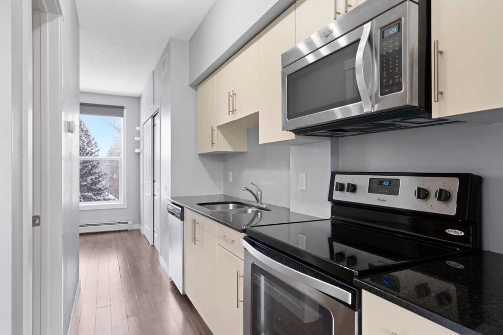 Photo of 1740 9 Street NW #402, Calgary, AB T2M 4Z5 (MLS # A2274422)