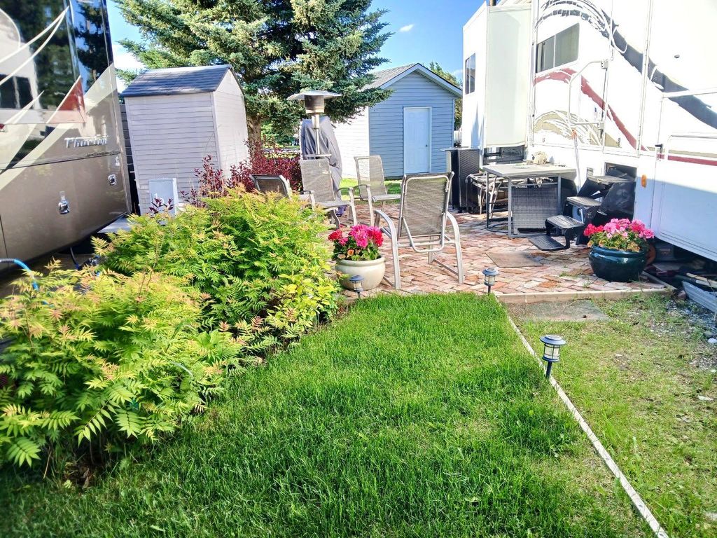 Photo of 370165 79 Street E #103, Rural Foothills County, AB T1S 1A5 (MLS # A2322707)
