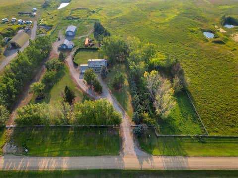 Photo of 233081 Glenmore View Road, Rural Rocky View County, AB T2P 2G6 (MLS # A2261533)