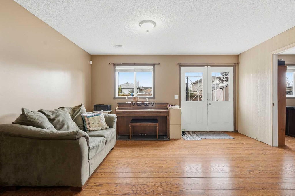 Photo of 58 Cimarron Meadows Road, Okotoks, AB T1S 1T6 (MLS # A2345308)