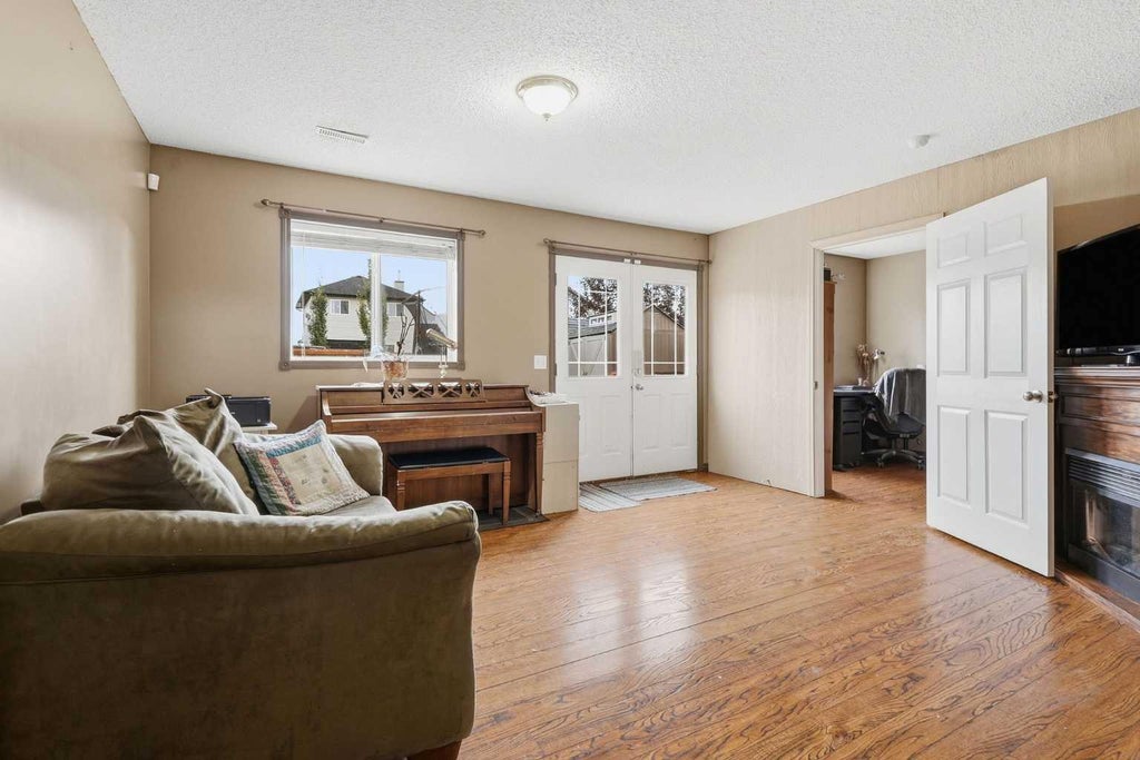 Photo of 58 Cimarron Meadows Road, Okotoks, AB T1S 1T6 (MLS # A2345308)