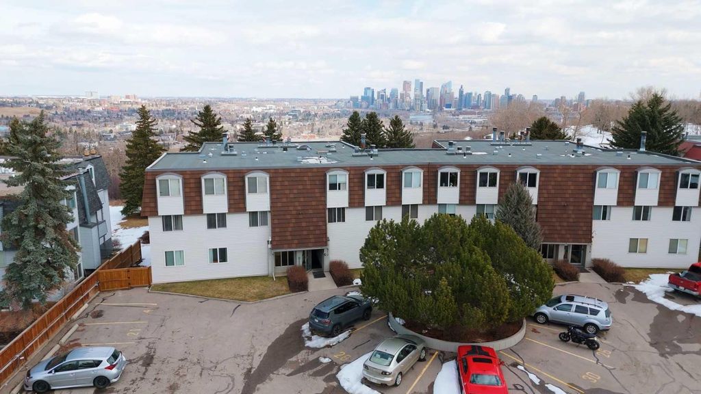 Photo of 512 Cedar Crescent SW #201, Calgary, AB T3C 2Y8 (MLS # A2304899)