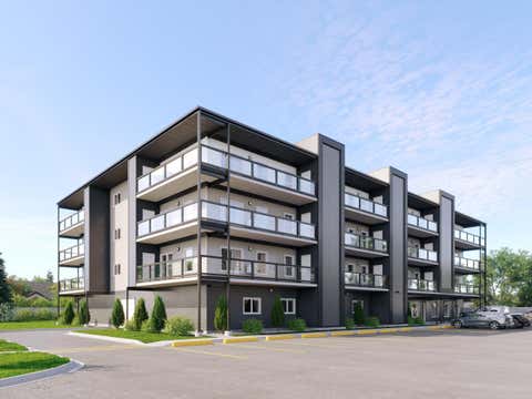 Photo of 101 Willowridge Drive #403, Diamond Valley, AB T0L 0H0 (MLS # A2328637)