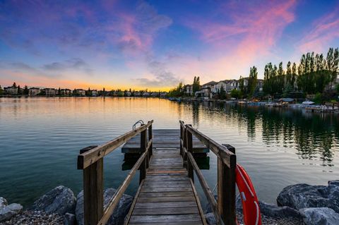 Photo of 4 Crystal Shores Landing, Okotoks, AB T1S 2C5 (MLS # A2321166)