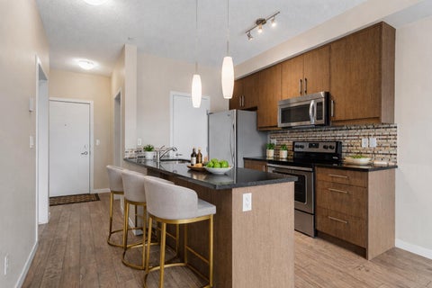 Photo of 402 Marquis Lane SE #311, Calgary, AB T3M 2G7 (MLS # A2320377)