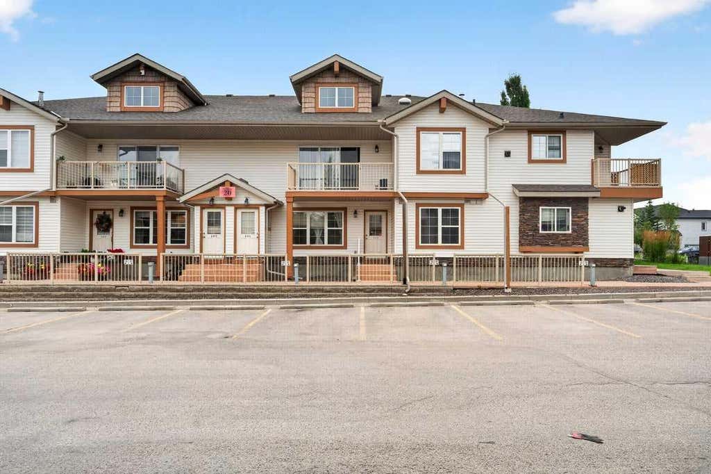 Photo of 20 Panatella Landing NW #104, Calgary, AB T3K 0K8 (MLS # A2336710)