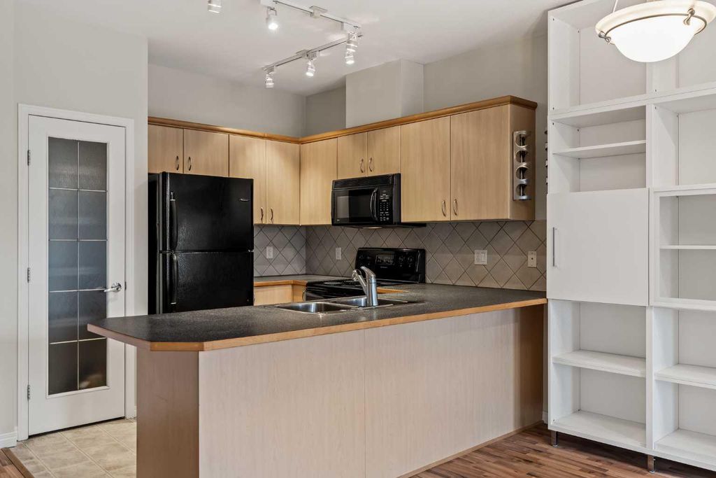 Photo of 3651 Marda Link SW #206, Calgary, AB T3T 6J7 (MLS # A2287127)