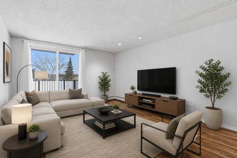 Photo of 80 Galbraith Drive SW #14D, Calgary, AB T3E 4Z6 (MLS # A2334452)