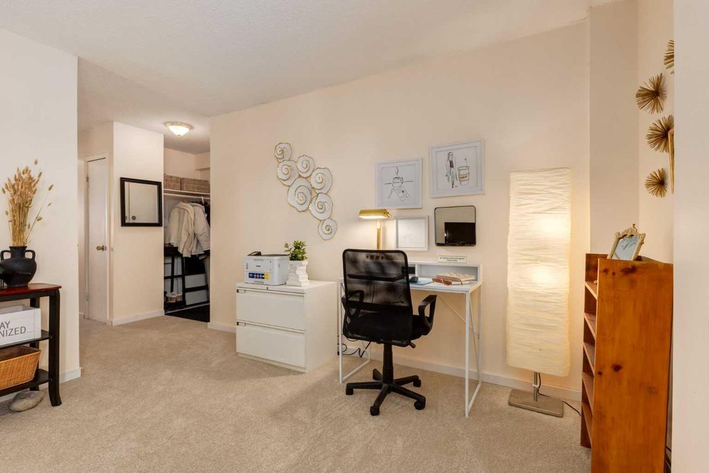 Photo of 315 Heritage Drive SE #120, Calgary, AB T2H 1N2 (MLS # A2311841)