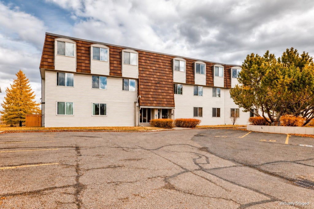 Photo of 512 Cedar Crescent SW #201, Calgary, AB T3C 2Y8 (MLS # A2352859)