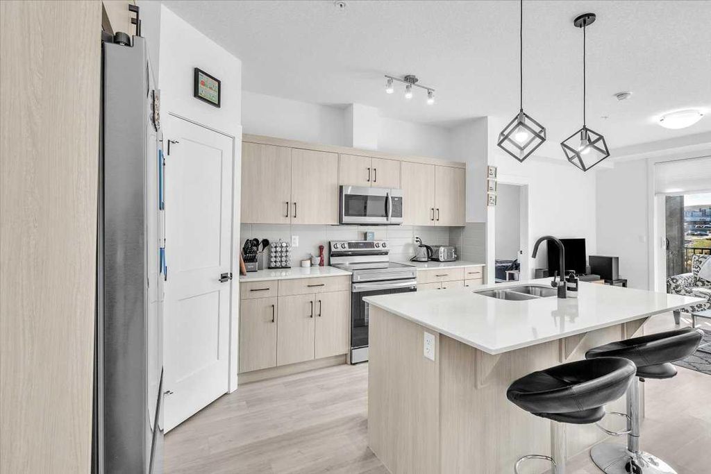 Photo of 30 Sage Hill Walk NW #305, Calgary, AB T3R 2A9 (MLS # A2293575)