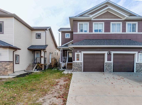 Photo of 91 Baysprings Way SW, Airdrie, AB T4B 4C4 (MLS # A2350827)