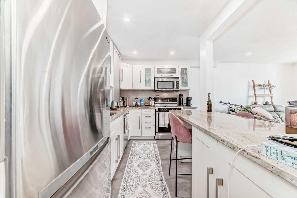 Photo of 1817 16 Street SW #103, Calgary, AB T2T 4E3 (MLS # A2286283)