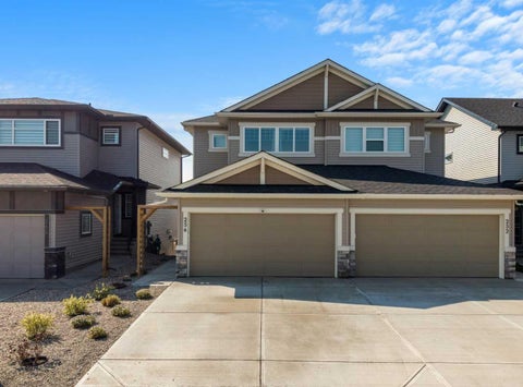 Photo of 256 Heritage Heights, Cochrane, AB T4C 3A7 (MLS # A2338398)