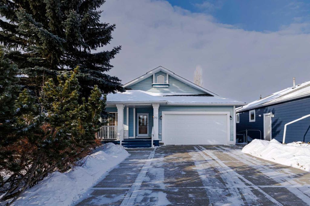 Photo of 70 Riverview Circle, Cochrane, AB T4C 1K3 (MLS # A2292705)