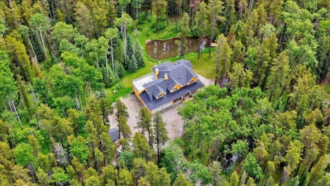 Photo of 23 Highlands Boulevard, Bragg Creek, AB T0L 0K0 (MLS # A2308473)