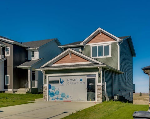 Photo of 1188 Iron Ridge Avenue, Crossfield, AB T0M 0S0 (MLS # A2353462)