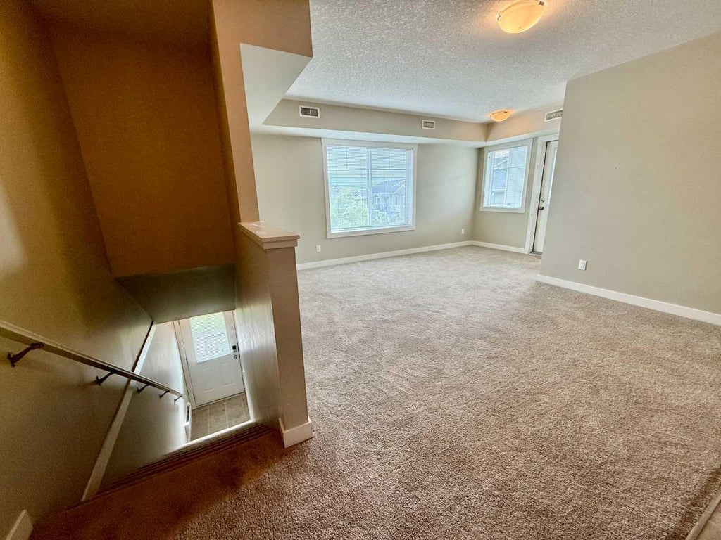 Photo of 300 Marina Drive #161, Chestermere, AB T1X 0P6 (MLS # A2310142)