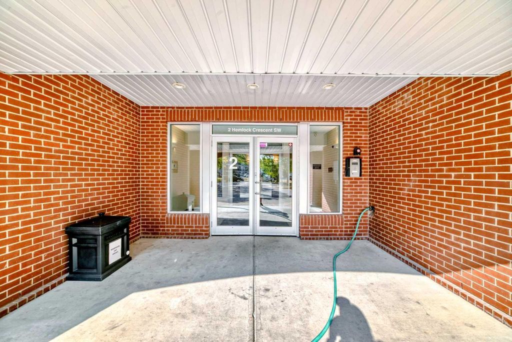 Photo of 2 Hemlock Crescent SW #214, Calgary, AB T3C 2Z1 (MLS # A2288502)