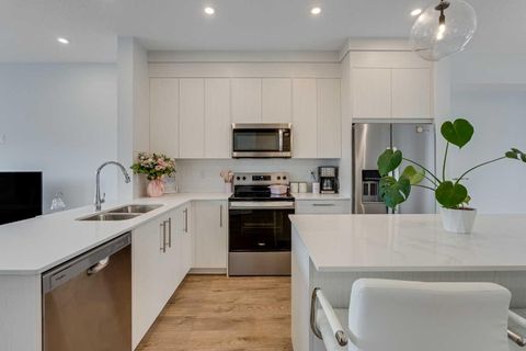 Photo of 6 Merganser Drive #302, Chestermere, AB T1X 2Y2 (MLS # A2277057)