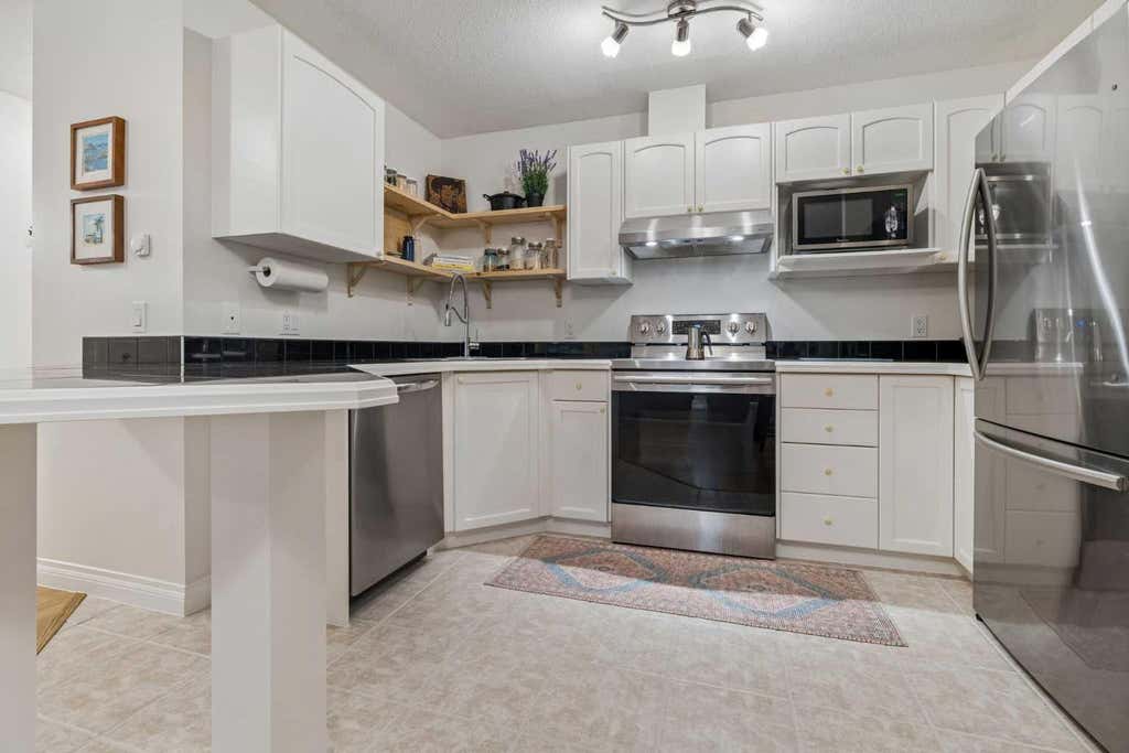 Photo of 1631 28 Avenue SW #310, Calgary, AB T2T 1J5 (MLS # A2316112)