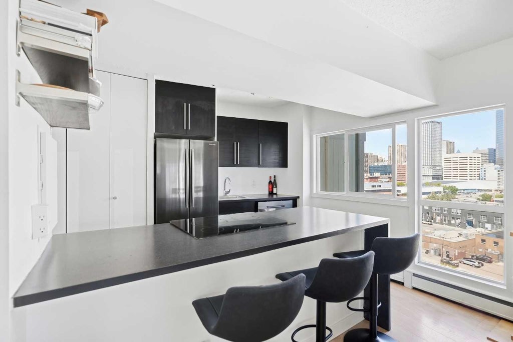Photo of 1209 6 Street SW #1004, Calgary, AB T2R 0Z5 (MLS # A2345835)