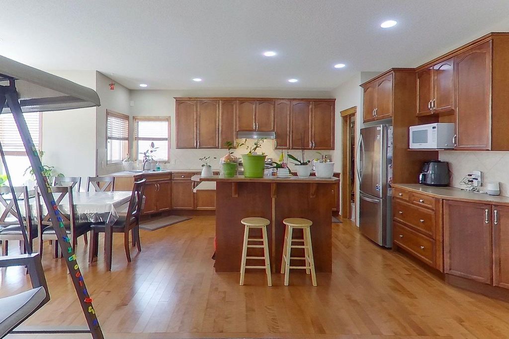 Photo of 98 Pantego Road NW, Calgary, AB T3K 0B7 (MLS # A2279941)