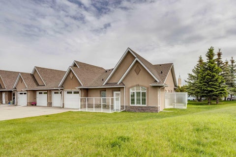 Photo of 20 River Heights View #2, Cochrane, AB T4C 0M9 (MLS # A2340313)
