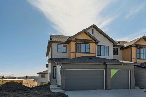 Photo of 410 Heritage Boulevard, Cochrane, AB T4C 0L3 (MLS # A2349079)