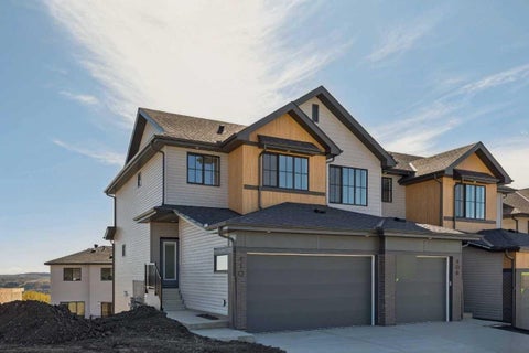 Photo of 410 Heritage Boulevard, Cochrane, AB T4C 0L3 (MLS # A2349079)