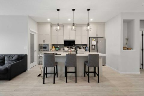 Photo of 22 Edith Manor NW, Calgary, AB T3R 1Y7 (MLS # A2312381)