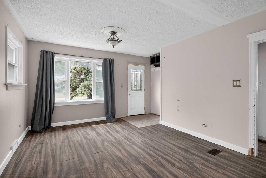 Photo of 504 1 Avenue NE, Airdrie, AB T4B 1R1 (MLS # A2318619)