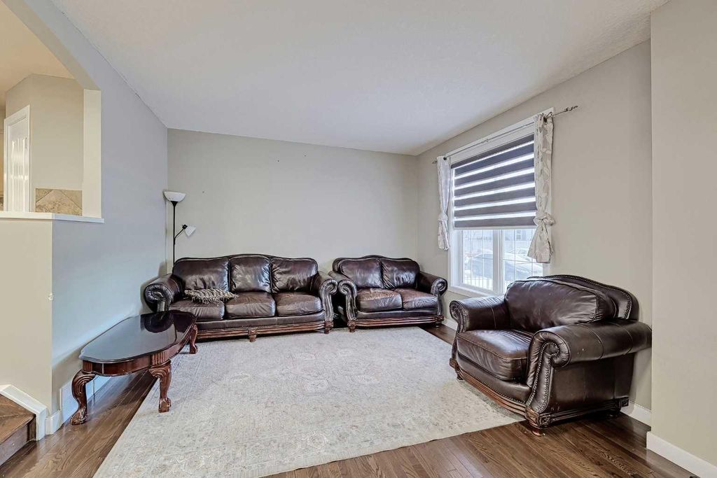 Photo of 303 Saddlebrook Way NE, Calgary, AB T3J 0B4 (MLS # A2288192)