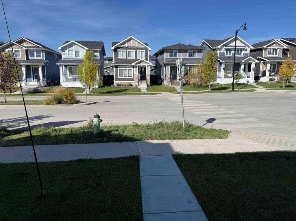 Photo of 342 Sundown Road, Cochrane, AB T4C 3H2 (MLS # A2346464)