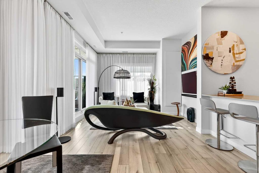 Photo of 255 Les Jardins Park SE #102, Calgary, AB T2C 5W9 (MLS # A2293107)