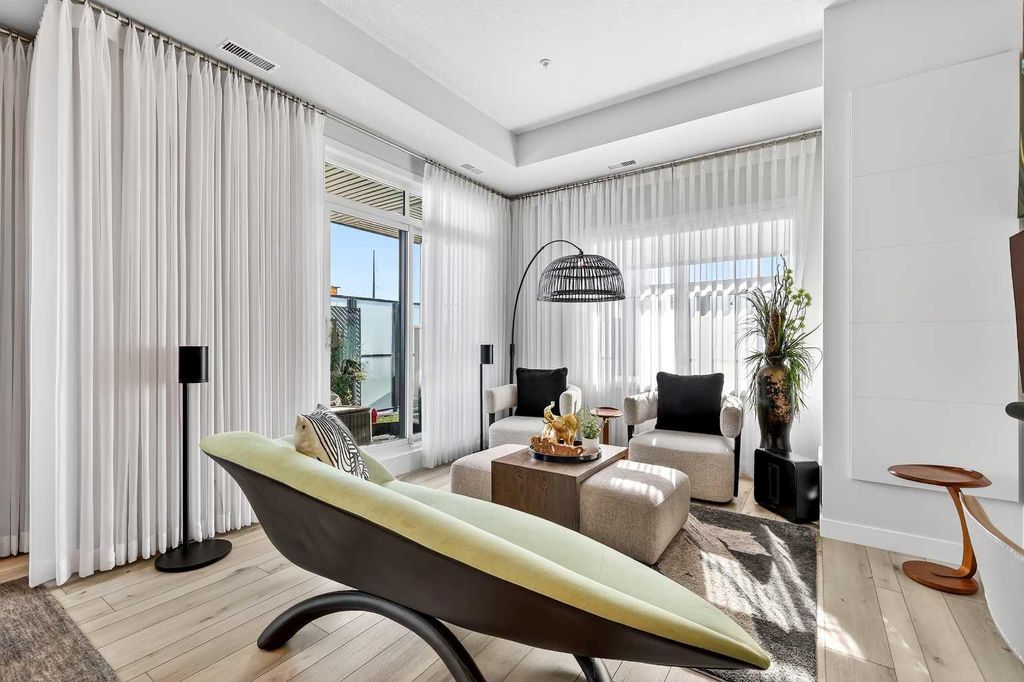 Photo of 255 Les Jardins Park SE #102, Calgary, AB T2C 5W9 (MLS # A2293107)