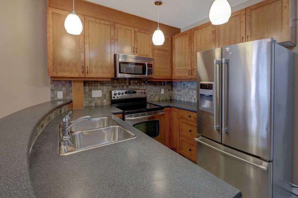 Photo of 8 Hemlock Crescent SW #209, Calgary, AB T3C 2Z1 (MLS # A2292718)