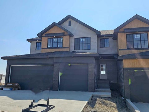 Photo of 406 Heritage Boulevard, Cochrane, AB T4C 0L3 (MLS # A2354989)