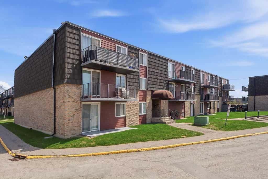 Photo of 80 Galbraith Drive SW #8C, Calgary, AB T3E 4Z6 (MLS # A2310446)