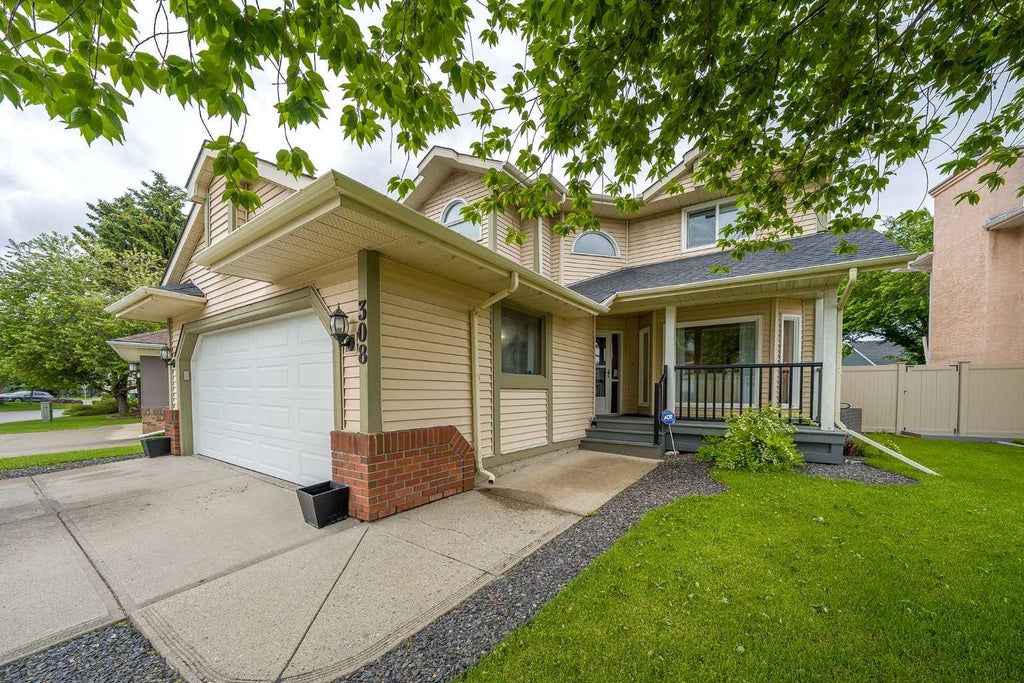 Photo of 308 Douglasbank Drive SE, Calgary, AB T2Z 3C7 (MLS # A2322927)